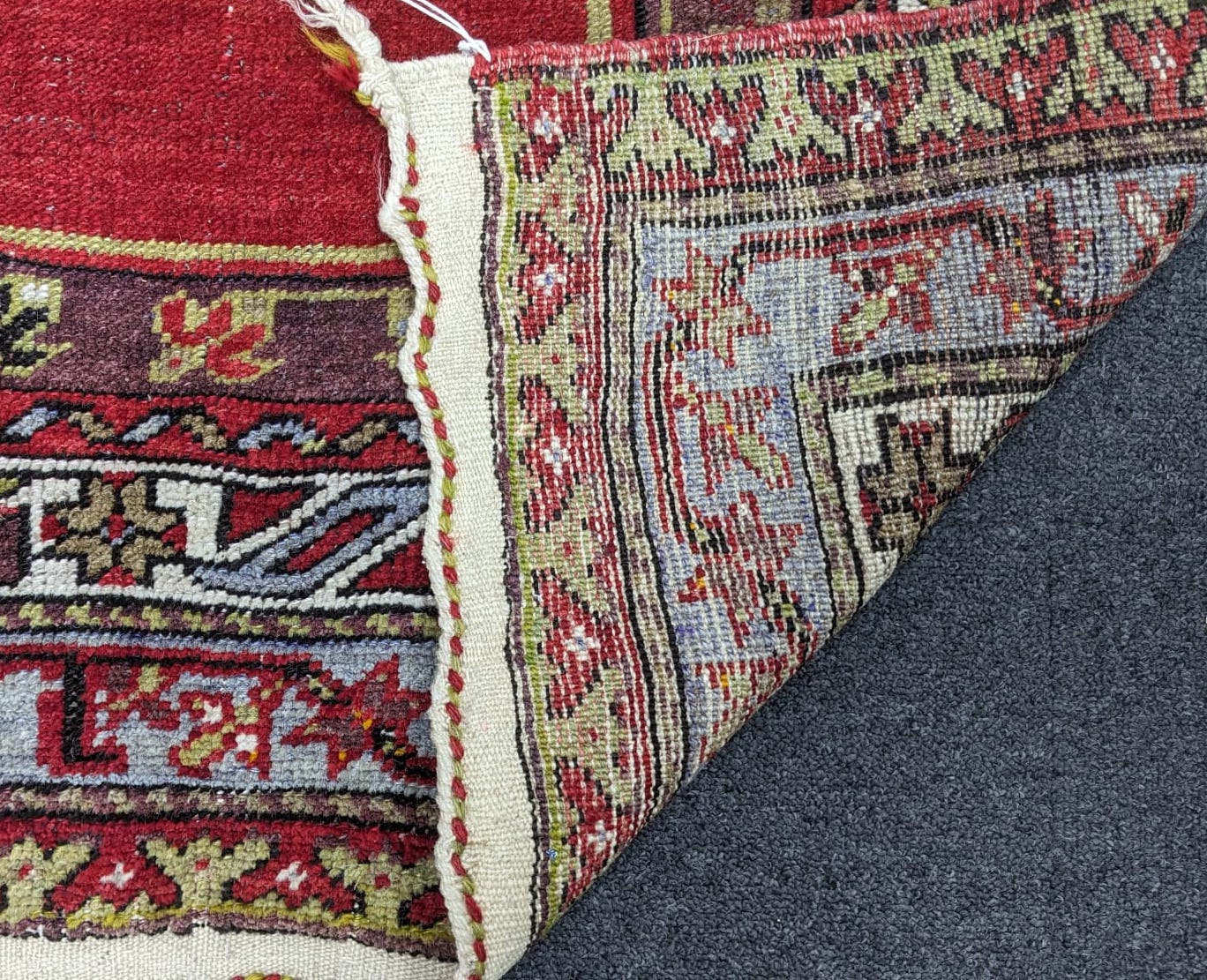 A Kesimuhsine Konya red ground prayer rug, 194 x 104cm